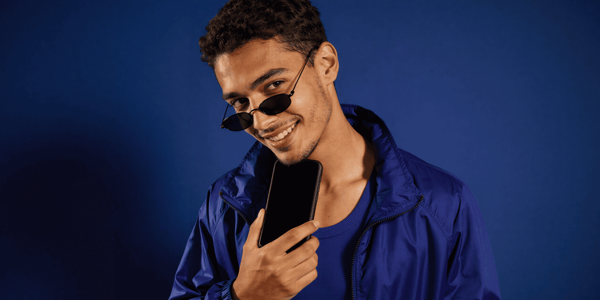 Smiling Man with Phone