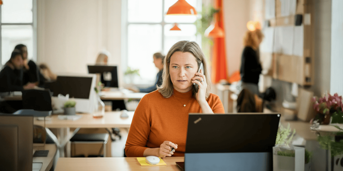 Woman in Office on Phone